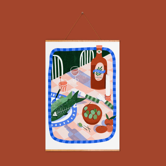 limited edition print, of a Mediterranean table, a plate of fish, bowl of olives, some oranges a candle and a bottle of olive oil on a gingham tablecloth. Green blue and terracotta colours. 